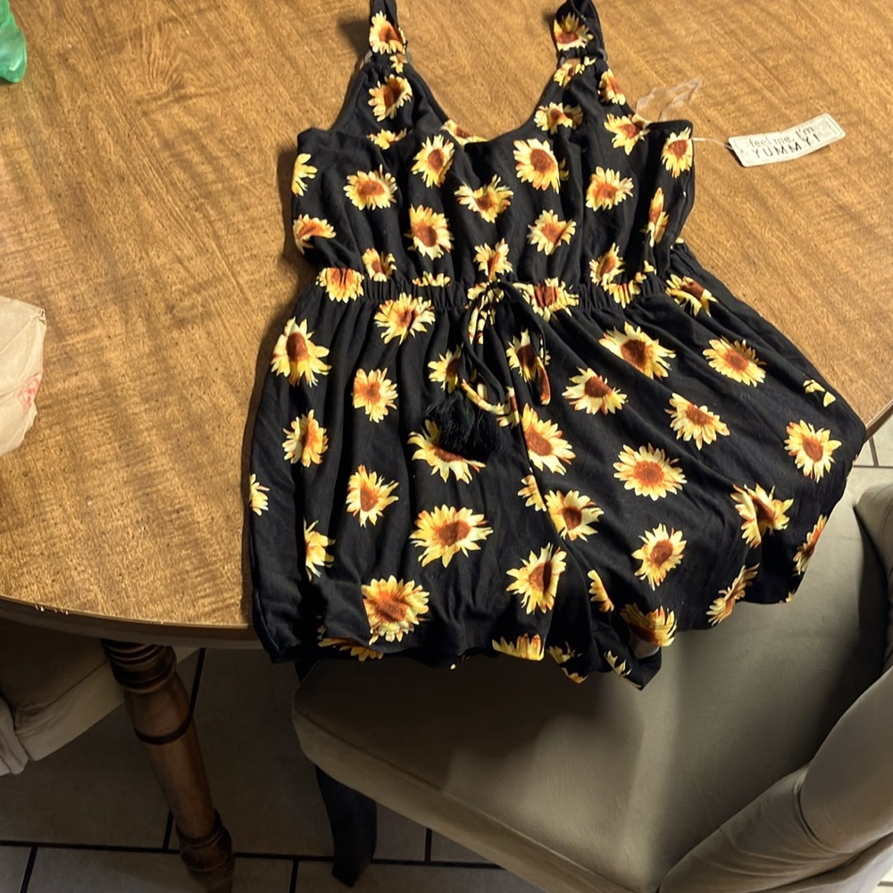 Brand new romper; Never before worn for girls ages 10-12. Sized a medium.